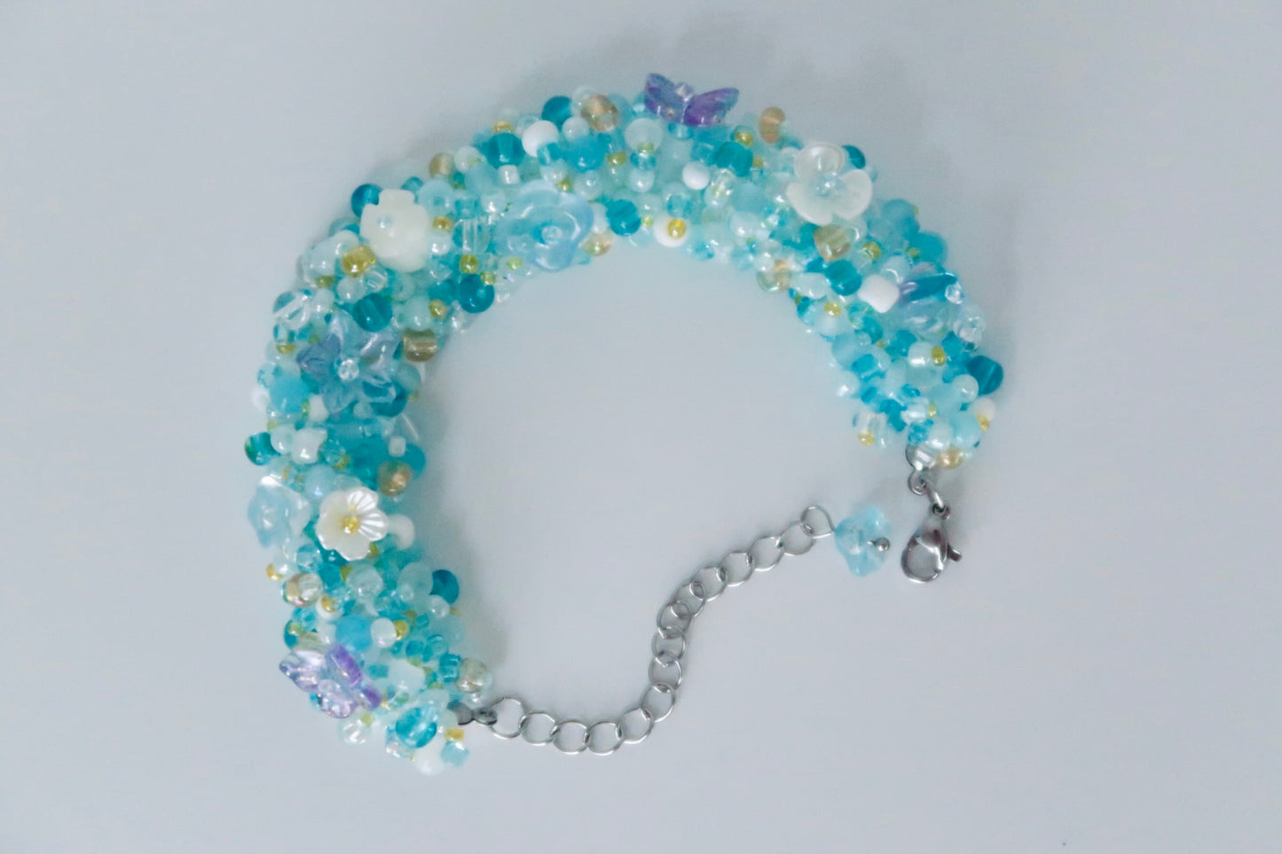 Colorgr, handcrafted intricate bracelet in ocean colors with imported seed beads, unique and niche accessory